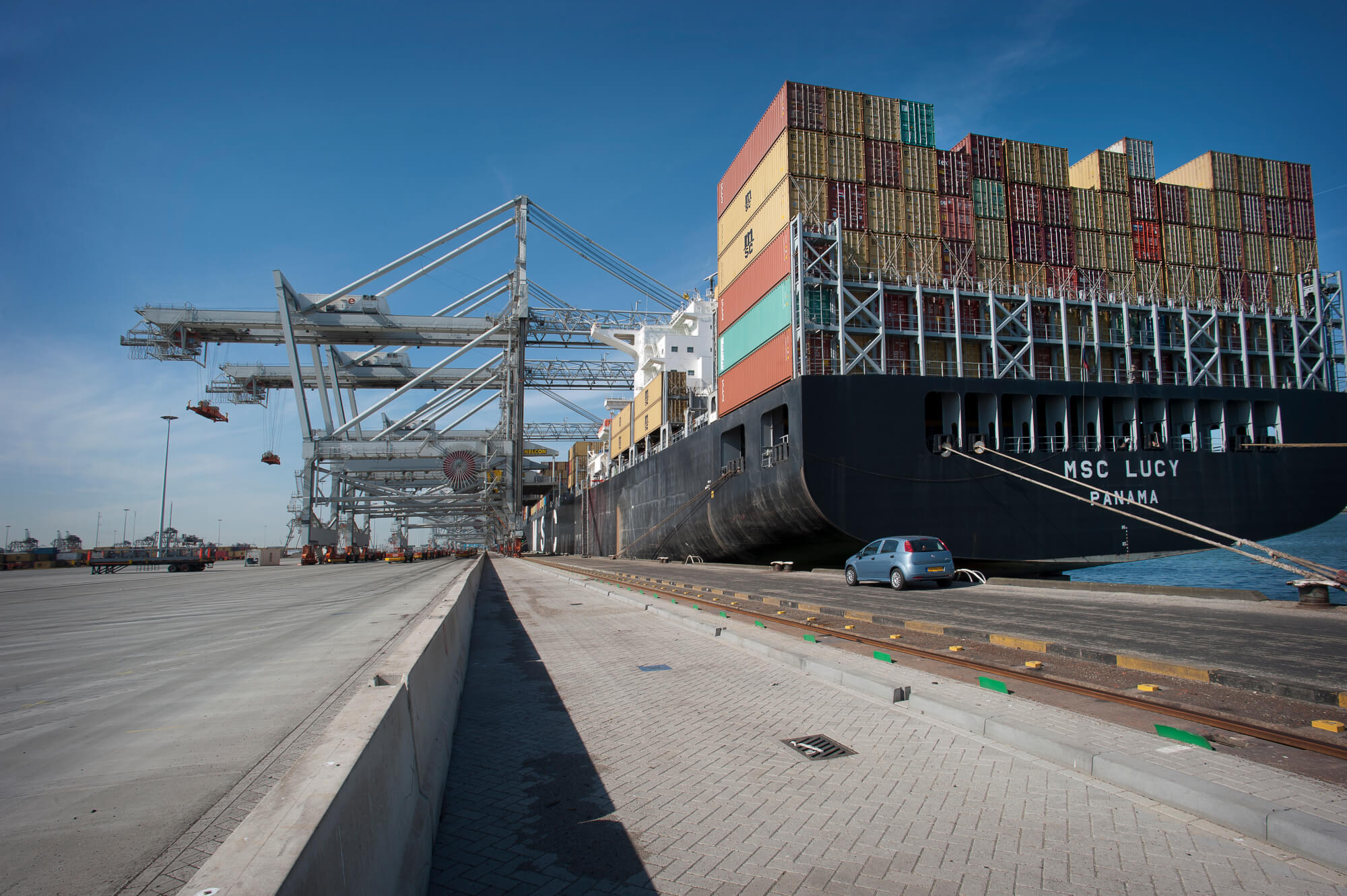 Picture of a docked freight ship by Miranda Vijfvinkel